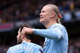 Manchester City beats Brentford 3-0 to stay in title race